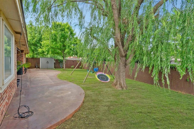 4605 NW 161st St, Edmond, OK 73013 - view of yard featuring a patio and a playground
