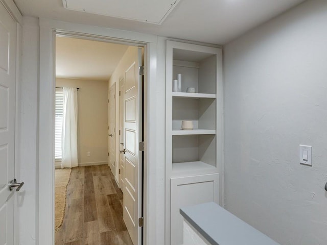 1110 Sherwood Ln Unit 223, Nichols Hills, OK 73116 - hall featuring wood finished floors and attic access