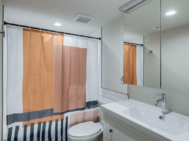1110 Sherwood Ln Unit 223, Nichols Hills, OK 73116 - bathroom with vanity, recessed lighting, and a shower with shower curtain