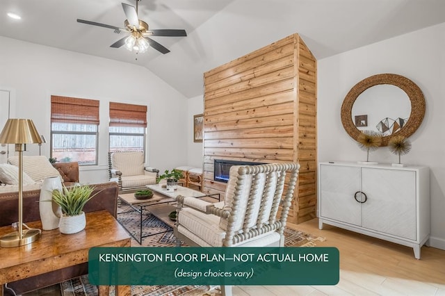 12808 NW 4th St, Yukon, OK 73099 - living room featuring a stone fireplace, lofted ceiling, a ceiling fan, and wood finished floors