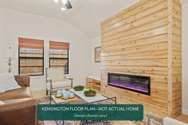 12808 NW 4th St, Yukon, OK 73099 - living room with lofted ceiling, a glass covered fireplace, ceiling fan, wood finished floors, and baseboards