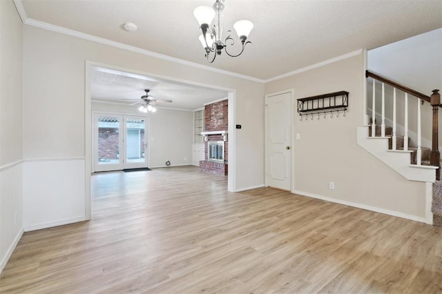 3119 W Wilshire Blvd, Oklahoma City, OK 73116 - unfurnished room featuring light wood-type flooring, a chandelier, stairway, ornamental molding, and ceiling fan