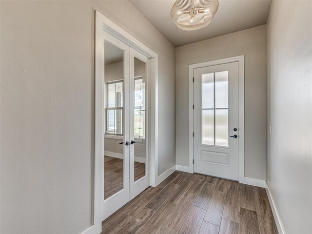 6841 Lake View Ct, Cashion, OK 73016 - doorway to outside with french doors, dark wood finished floors, and baseboards