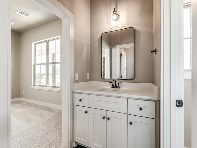 6841 Lake View Ct, Cashion, OK 73016 - bathroom with vanity and baseboards