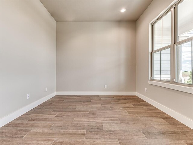 6841 Lake View Ct, Cashion, OK 73016 - spare room with recessed lighting, baseboards, and light wood-style flooring
