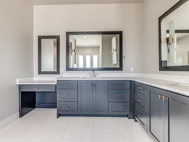 6860 Lake View Ct, Cashion, OK 73016 - bathroom featuring double vanity, marble look tiles, and baseboards