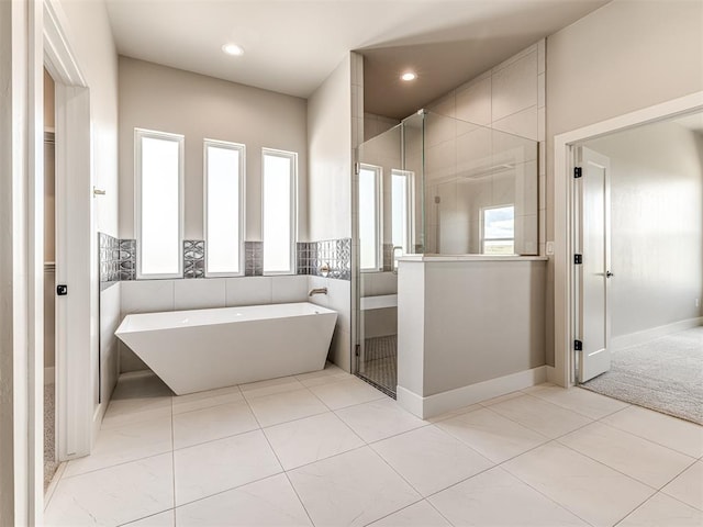 6860 Lake View Ct, Cashion, OK 73016 - full bath featuring a freestanding tub, a stall shower, tile patterned floors, and recessed lighting