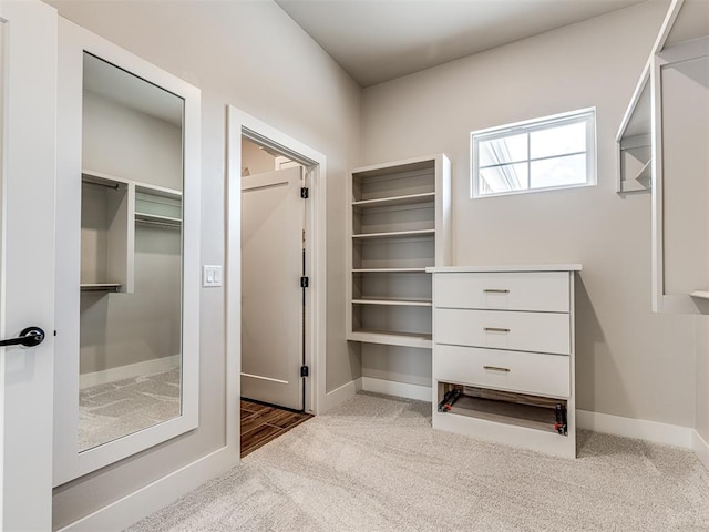 6860 Lake View Ct, Cashion, OK 73016 - walk in closet featuring carpet flooring