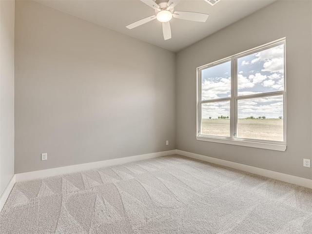6860 Lake View Ct, Cashion, OK 73016 - spare room featuring healthy amount of natural light, baseboards, and light colored carpet
