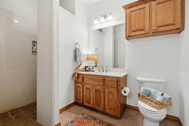 607 Pool Pl, Shawnee, OK 74801 - bathroom featuring vanity, a walk in shower, and tile patterned flooring