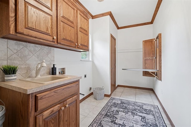 607 Pool Pl, Shawnee, OK 74801 - laundry room featuring hookup for an electric dryer, cabinet space, hookup for a washing machine, ornamental molding, and light tile patterned floors