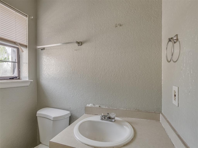 2720 SW 74th St Unit 6, Oklahoma City, OK 73159 - bathroom featuring toilet and vanity