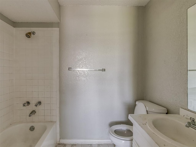 2720 SW 74th St Unit 6, Oklahoma City, OK 73159 - bathroom with toilet, vanity, bathing tub / shower combination, and baseboards