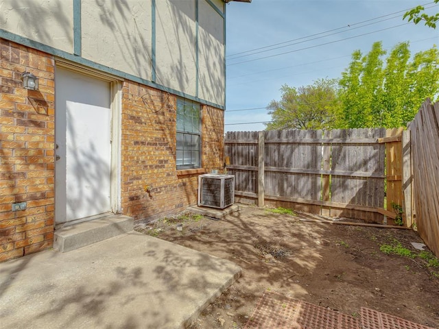 2720 SW 74th St Unit 6, Oklahoma City, OK 73159 - entrance to property with brick siding and central air condition unit