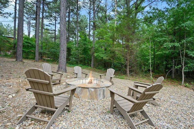 172 Triton Trl, Broken Bow, OK 74728 - view of patio / terrace with a fire pit