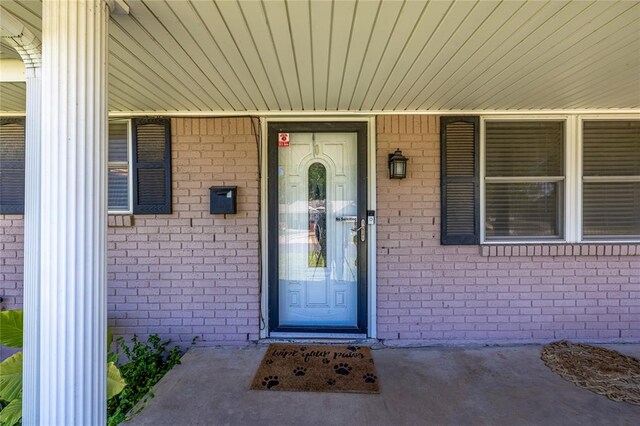 840 NW 14th St, Moore, OK 73160 - property entrance with brick siding