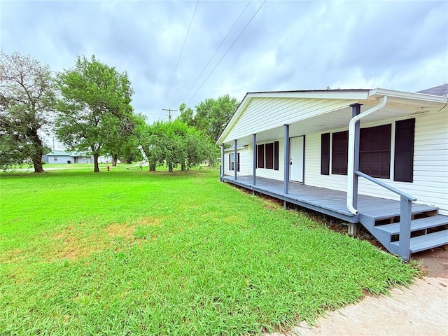 402 E 6th St, Amber, OK 73004 - view of property exterior with a lawn and covered porch