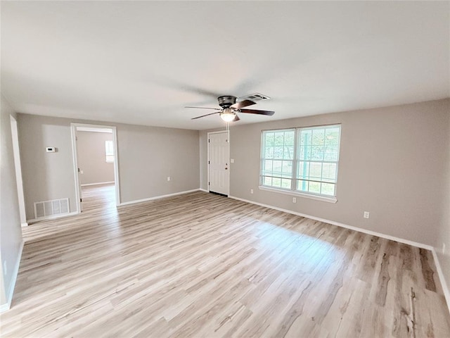 402 E 6th St, Amber, OK 73004 - spare room with a ceiling fan, light wood-type flooring, and baseboards