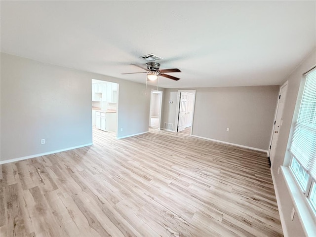 402 E 6th St, Amber, OK 73004 - spare room featuring ceiling fan, light wood-style flooring, and baseboards