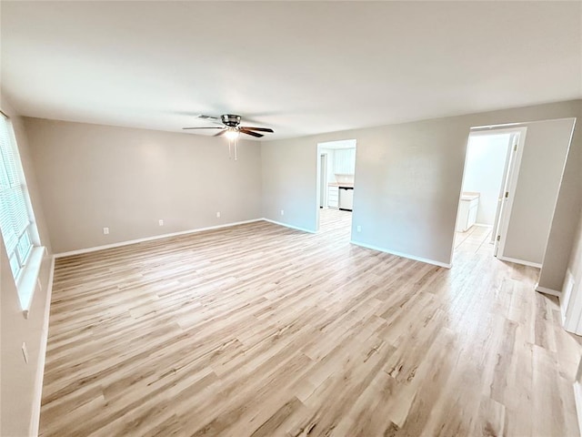 402 E 6th St, Amber, OK 73004 - empty room with ceiling fan, light wood-style flooring, and baseboards