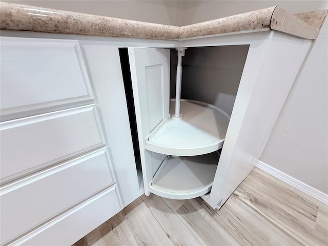 402 E 6th St, Amber, OK 73004 - detailed view of wood finished floors and baseboards