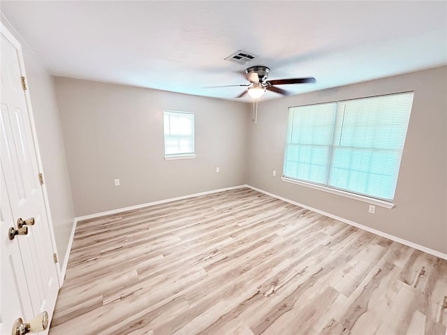 402 E 6th St, Amber, OK 73004 - unfurnished bedroom featuring light wood-style flooring, baseboards, and a ceiling fan