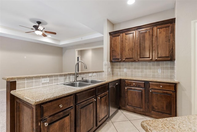 10650 Hunters Pointe, Edmond, OK 73034 - kitchen with a sink, dishwasher, tasteful backsplash, a peninsula, and recessed lighting
