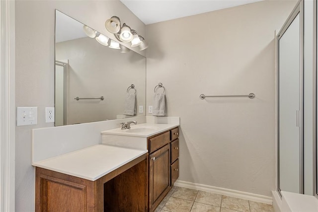10650 Hunters Pointe, Edmond, OK 73034 - bathroom with vanity, an enclosed shower, baseboards, and tile patterned flooring