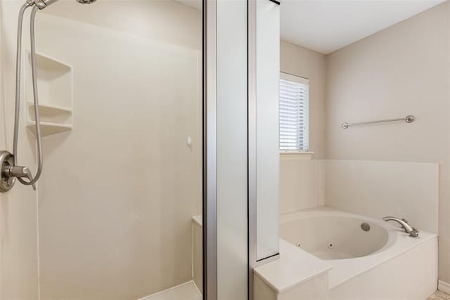 10650 Hunters Pointe, Edmond, OK 73034 - full bathroom featuring a whirlpool tub and a stall shower