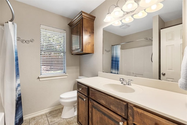 10650 Hunters Pointe, Edmond, OK 73034 - bathroom featuring vanity, plenty of natural light, toilet, and baseboards