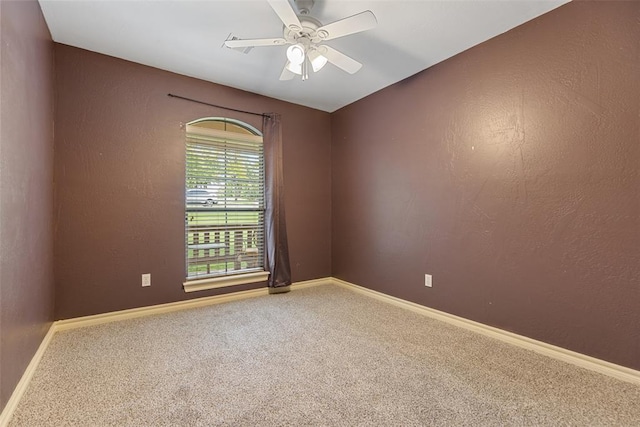 10650 Hunters Pointe, Edmond, OK 73034 - unfurnished room featuring carpet flooring, ceiling fan, and baseboards