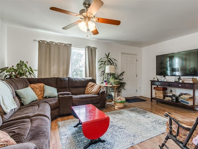 4900 S Post Rd, Oklahoma City, OK 73150 - living room with a ceiling fan and wood finished floors