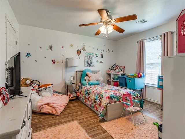4900 S Post Rd, Oklahoma City, OK 73150 - bedroom featuring light wood-style flooring and a ceiling fan