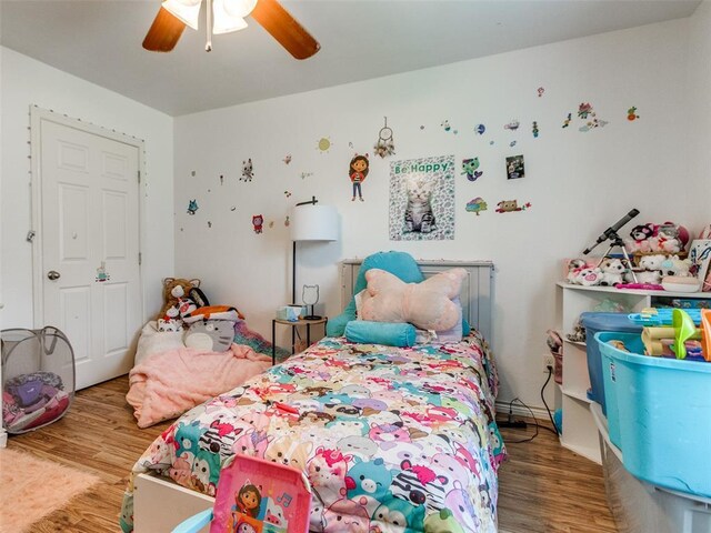 4900 S Post Rd, Oklahoma City, OK 73150 - bedroom with wood finished floors and ceiling fan