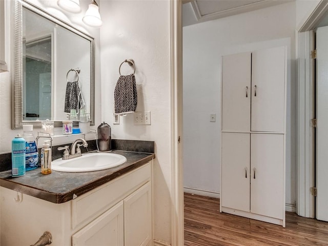 4900 S Post Rd, Oklahoma City, OK 73150 - bathroom with vanity and wood finished floors