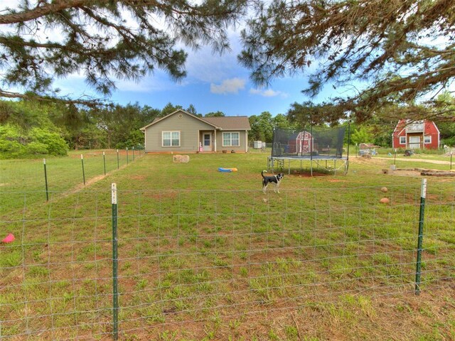 4900 S Post Rd, Oklahoma City, OK 73150 - view of yard featuring a trampoline