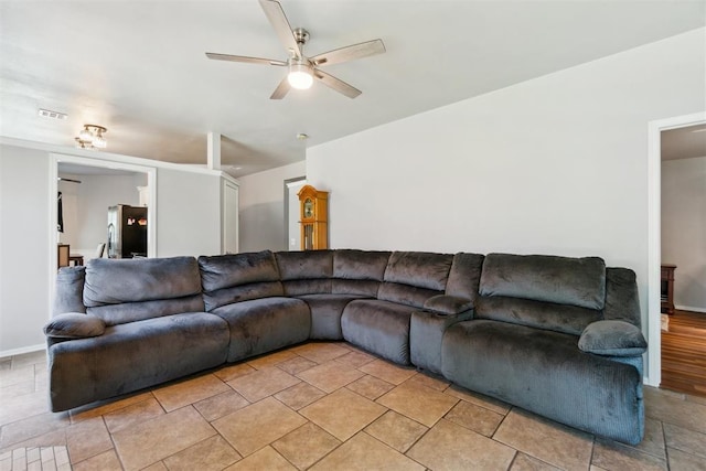 1225 Clover Rd, Moore, OK 73160 - living area featuring ceiling fan and baseboards