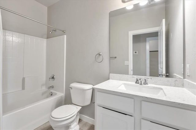 1330 Round Leaf Rd, Edmond, OK 73034 - full bathroom featuring vanity, toilet, and shower / tub combination