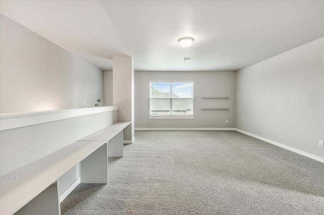 1330 Round Leaf Rd, Edmond, OK 73034 - carpeted spare room with baseboards