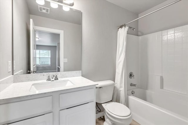 1330 Round Leaf Rd, Edmond, OK 73034 - bathroom featuring vanity, shower / bath combo, and toilet