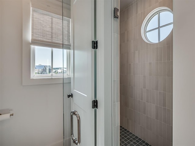51 Lower Green Way, Carlton Landing, OK 74432 - bathroom with a tile shower and healthy amount of natural light