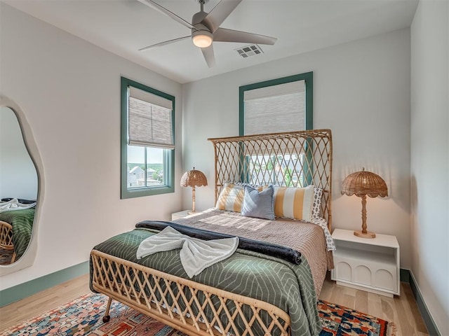 51 Lower Green Way, Carlton Landing, OK 74432 - bedroom with wood finished floors and ceiling fan