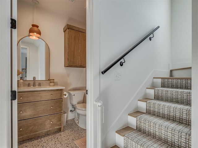 51 Lower Green Way, Carlton Landing, OK 74432 - bathroom with speckled floor, toilet, vanity, and baseboards