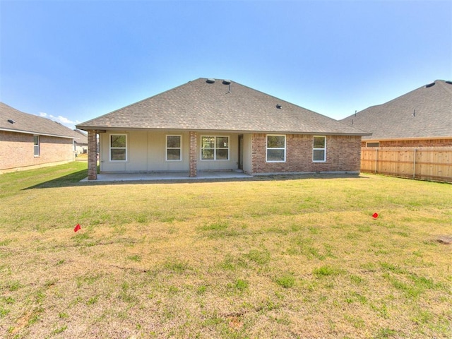 1241 SW 139th St, Oklahoma City, OK 73170 - back of property featuring a patio, a shingled roof, and brick siding