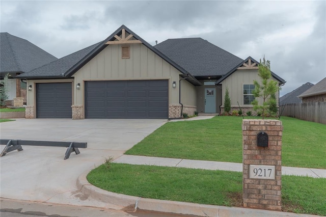 9217 SW 43rd St, Oklahoma City, OK 73179 - craftsman-style house with a garage, concrete driveway, and board and batten siding