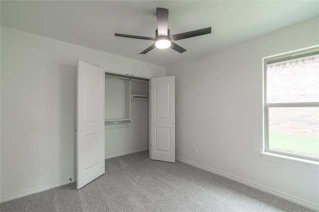 9217 SW 43rd St, Oklahoma City, OK 73179 - unfurnished bedroom with light colored carpet, a closet, a ceiling fan, and baseboards