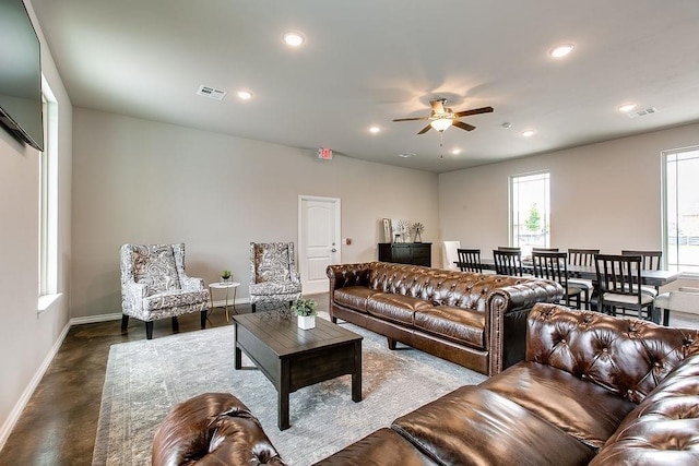 913 SW 141st St, Oklahoma City, OK 73170 - living room featuring baseboards, a ceiling fan, concrete flooring, and recessed lighting