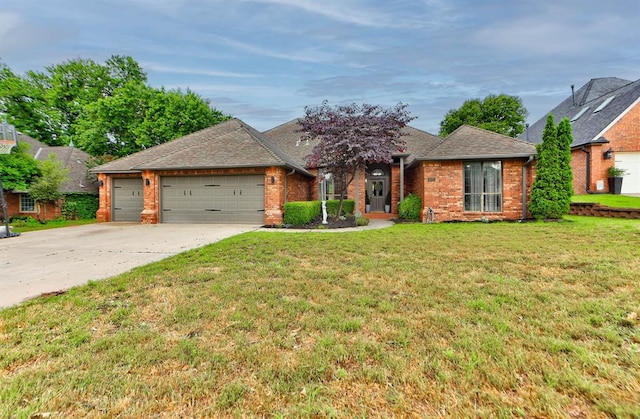 608 Shadow View Ct, Norman, OK 73072 - ranch-style house with an attached garage, concrete driveway, brick siding, a front lawn, and a shingled roof