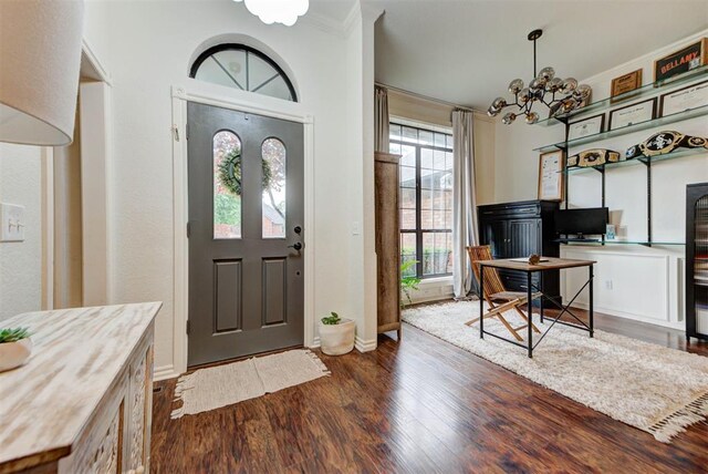 608 Shadow View Ct, Norman, OK 73072 - entrance foyer with wood finished floors, a chandelier, crown molding, and baseboards