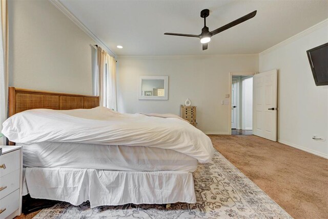 608 Shadow View Ct, Norman, OK 73072 - bedroom with crown molding, carpet floors, baseboards, and a ceiling fan